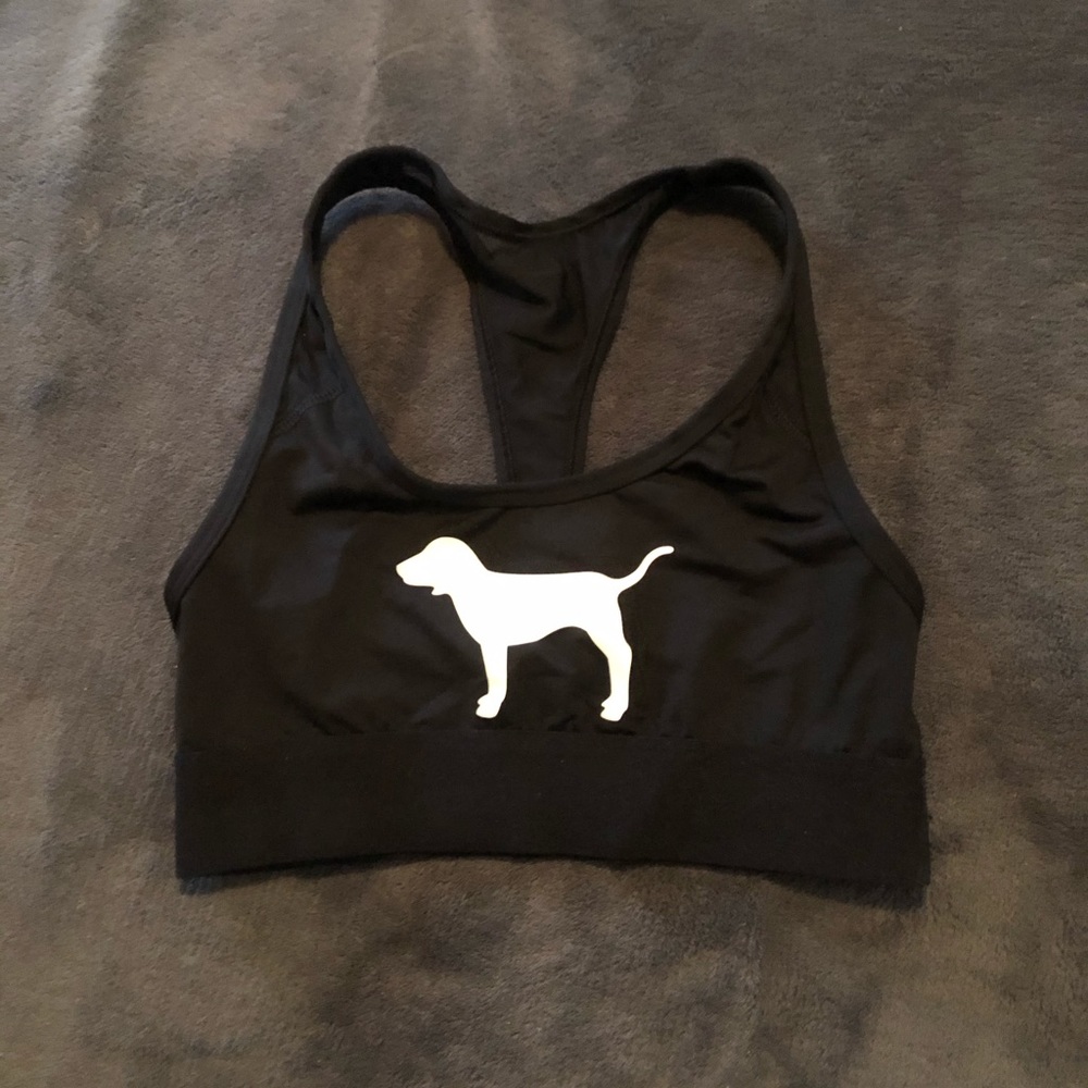 Pink VS. black sports bra